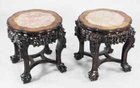 Two Chinese rouge marble topped rosewood graduated stands, late 19th century, both with octafoil