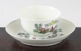 An early Worcester `Les Garcon Chinois` tea bowl and saucer, c.1760, decorated with a puce print by