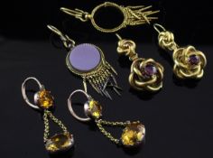 Three pairs of 19th century gold earrings, set with yellow paste, garnets, or carnelian, the latter