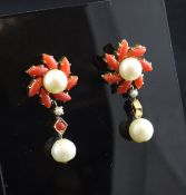 A pair of gold, coral and cultured pearl set drop earrings, of foliate design, with spiral borders,