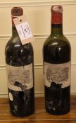 Two bottles of Chateau Lafite, Premier Cru Classe, Pauillac, including one 1950, upper shoulder;