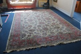 A Turkish sparta carpet, with field of scrolling foliage on a cream ground, with three row foliate