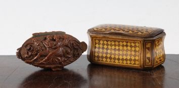 A 19th century Continental bombe shape parquetry inlaid table box, with canted corners, the lid