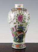 A Chinese famille rose baluster vase, late 19th century, painted with pheasants and other birds in