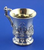An early Victorian silver christening mug, of baluster form, with engraved initials and embossed