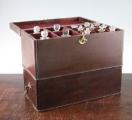 A Victorian mahogany apothecary chest, with hinged lid revealing sectioned compartments with glass