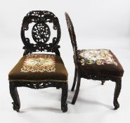 Four late 19th century Indian carved rosewood side chairs, comprising of three matching chairs,