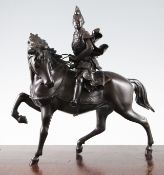 A Japanese bronze group of a warrior on horseback, Meiji period, his armour with dragon crest, the