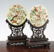 A pair of Chinese hardstone and wood table screens, early 20th century, the circular plaques