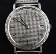 A gentleman`s 18ct white gold Audemars Piguet automatic dress wrist watch, with baton numerals,