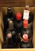 A seven bottle old wine assortment featuring one Chateau Pichon-Baron 1961, Pauillac, mid shoulder;