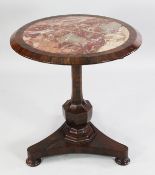 A Victorian rosewood circular tilt top centre table, with inset rouge marble top, on octagonal vase