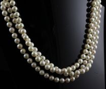 A triple strand cultured pearl choker necklace with 9ct gold set aquamarine and cultured pearl