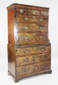 An 18th century walnut and featherbanded chest on chest, fitted three frieze drawers over three