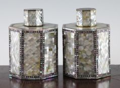 A pair of 19th century Syrian mother of pearl inlaid octagonal lidded canisters, 6.5in.