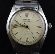 A gentleman`s 1950`s stainless steel Rolex Oyster Perpetual wrist watch, with baton numerals, model