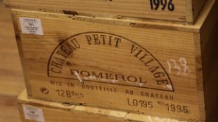 A case of twelve bottles of Chateau Petit Village 1995, Pomerol, owc.