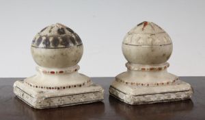 A pair of Indian white marble and hardstone inlaid carpet weights, Agra, 19th century, with onion