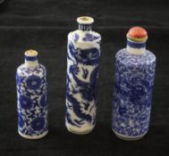 Three Chinese blue and white cylindrical snuff bottles, 1760-1880, two painted with five-claw