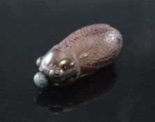 A Chinese amethyst `cicada` snuff bottle, naturalisticall carved with detailing all round, natural