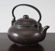 A Chinese Yixing teapot and cover, 19th century, possibly made for the Thai market, the exterior