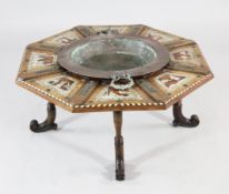 A Spanish octagonal brazier table, with a wide tortoiseshell and ivory inlaid border and central