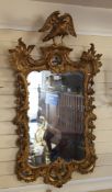 An 18th century carved giltwood and gesso wall mirror, with eagle crest and pierced acanthus C