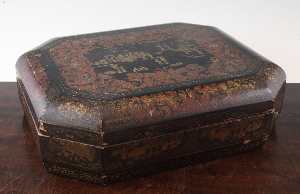 A Chinese export octagonal lacquer games box, the interior fitted with various lidded containers