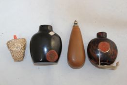 Four Chinese snuff bottles, the first brown mottled glass simulating tortoiseshell, 1730-1850, 5.
