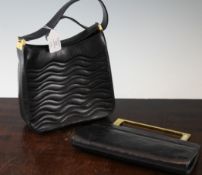 A Lalique black leather handbag and another