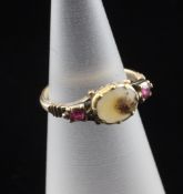 A George III gold, ruby and moss agate child`s ring, size A.