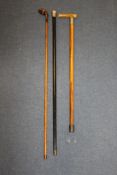 A late 19th century Sunday golf stick, marked for A.Coxon, 37in., together with two other silver