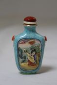 A Chinese enamelled and moulded porcelain snuff bottle, Qianlong mark, 1820-1850, moulded in relief
