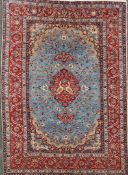 A 1960`s Central Persian Isphahan silk rug, with field of scrolling foliage and central medallion