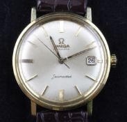 A gentleman`s gold plated and steel Omega Seamaster automatic wrist watch, with baton numerals and