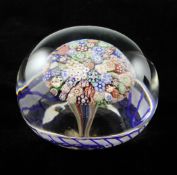 A Baccarat millefleur mushroom paperweight, c.1850, the polychrome canes close-packed within a