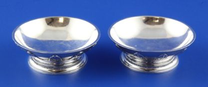 A pair of Victorian cast silver shallow bonbon dishes by Charles Frederick Hancock, of circular