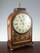 A Regency brass inset mahogany mantel bracket clock, with arched case and painted Roman dial, twin