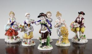 Six Sitzendorf porcelain figures, early 20th century, four emblematic of the seasons, and two of a