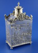 An ornate early 20th century Dutch 800 standard silver tea caddy and cover, of rectangular form,