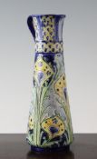 A Moorcroft Macintyre Florian `Peacock` jug, c. 1901, of slender form, in yellow blue and green