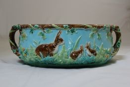 A George Jones `Full Nest` majolica game pie tureen base, late 19th century, the exterior moulded