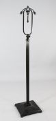 A 20th century patinated bronze adjustable twin light standard lamp, with reeded column and square