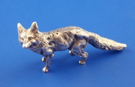 An early 20th century continental novelty silver pepperette modelled as a fox, with detachable