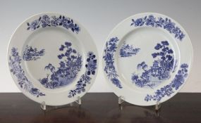 A pair of Chinese Nanking cargo blue and white plates, c.1752, each painted with pavilions in a