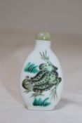 A Chinese enamelled porcelain `frog` snuff bottle, 1829-1880, of flattened pear form, enamelled to