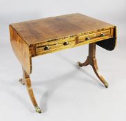 A Regency rosewood and satinwood crossbanded sofa table, with two frieze drawers opposing two dummy