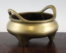 A large Chinese bronze ding shaped censer, Xuande six character mark, probably 18th century, the