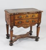 An 18th century Dutch walnut and floral marquetry inlaid two drawer side table, with square section