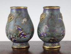 A pair of Chinese gilt copper bronze and cloisonne enamel hu vases, 18th / 19th century, each